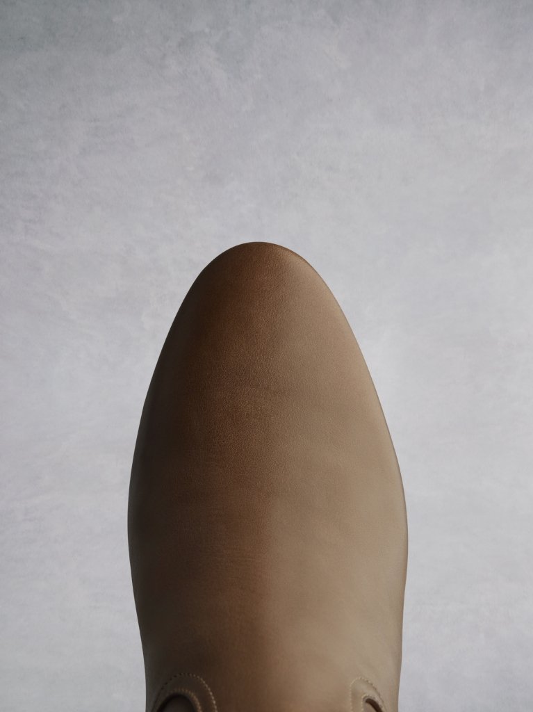 Comfortable round toe shape making this tan boot highly versatile.  