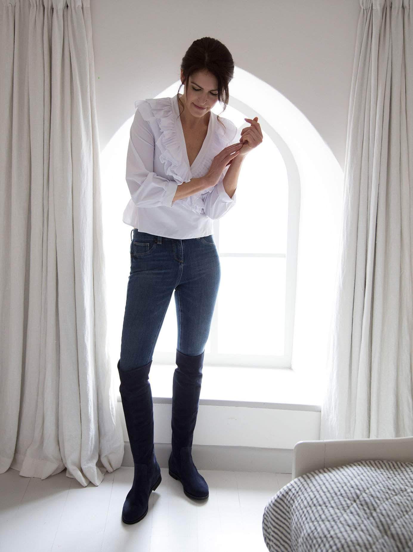 Stylish navy suede over-the-knee boots, perfect for both day and night. 