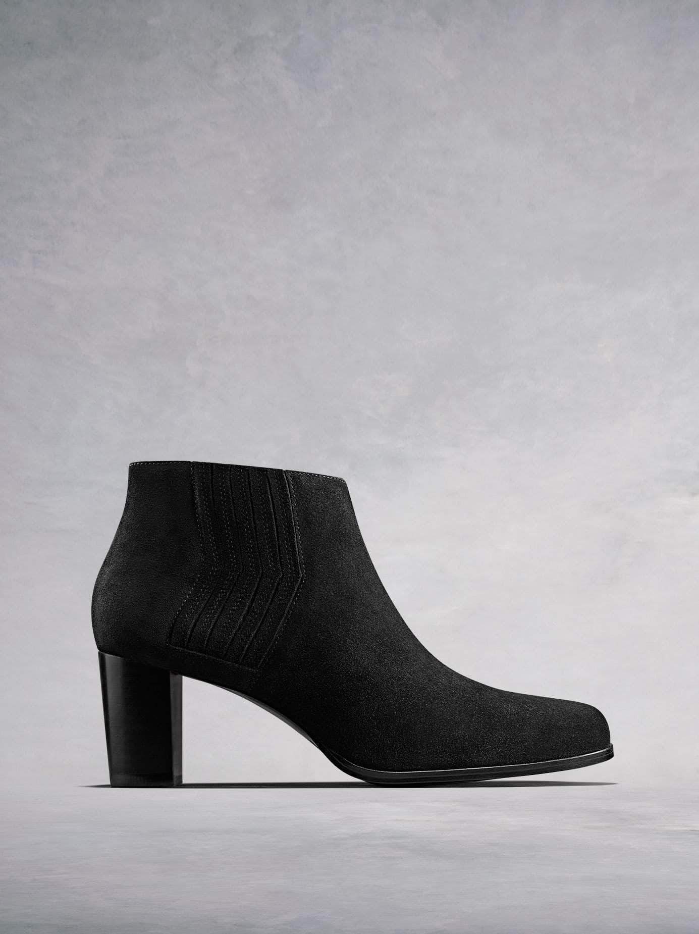 Miller, our black suede ankle boot, a modern take on the classic Chelsea boot. Available in our standard fit or wide fit.