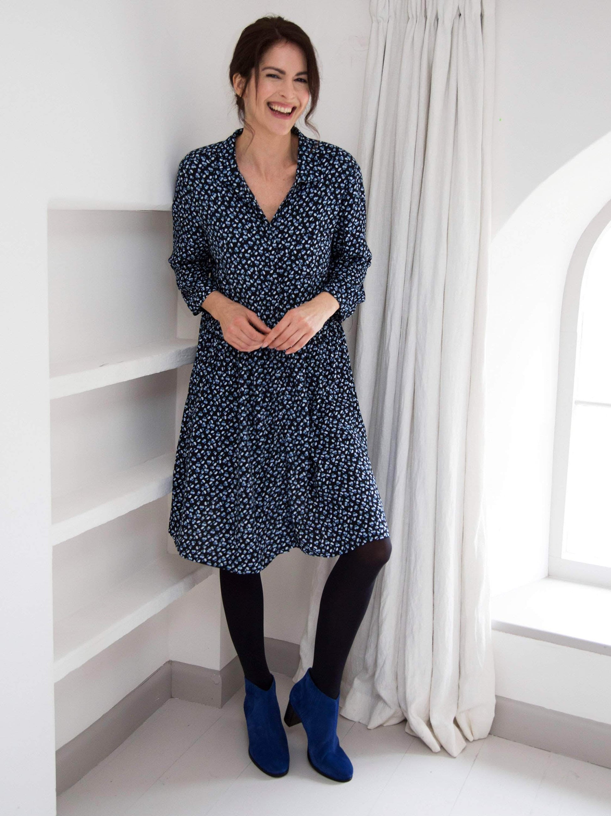 A modern take on the classic Chelsea boot with a practical black block heel.