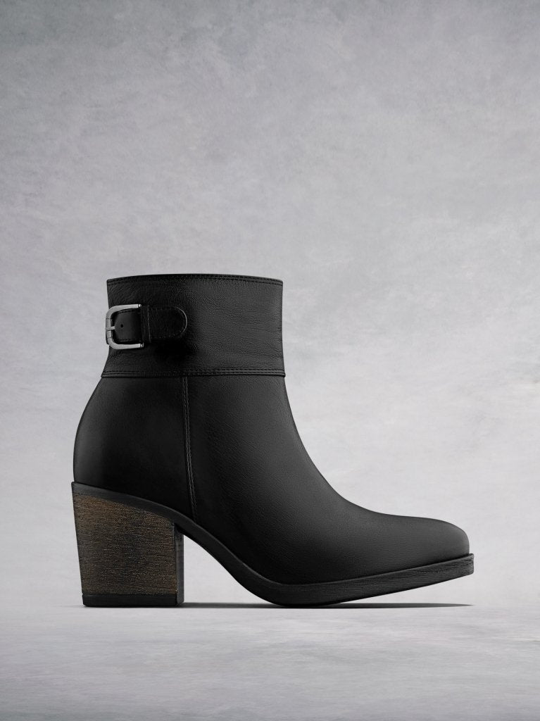 The Orpheus, a casual mid block heeled ankle boot in rustic black leather. 