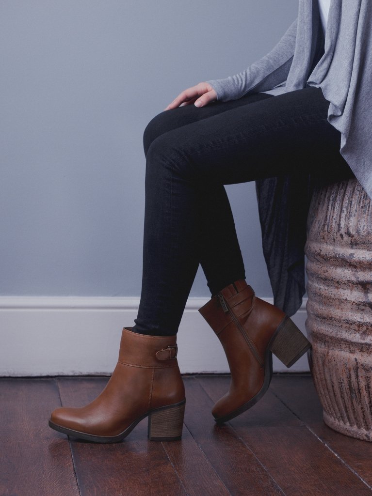 Everyday tan ankle boots, with a tan strap buckle detail around the ankle. 