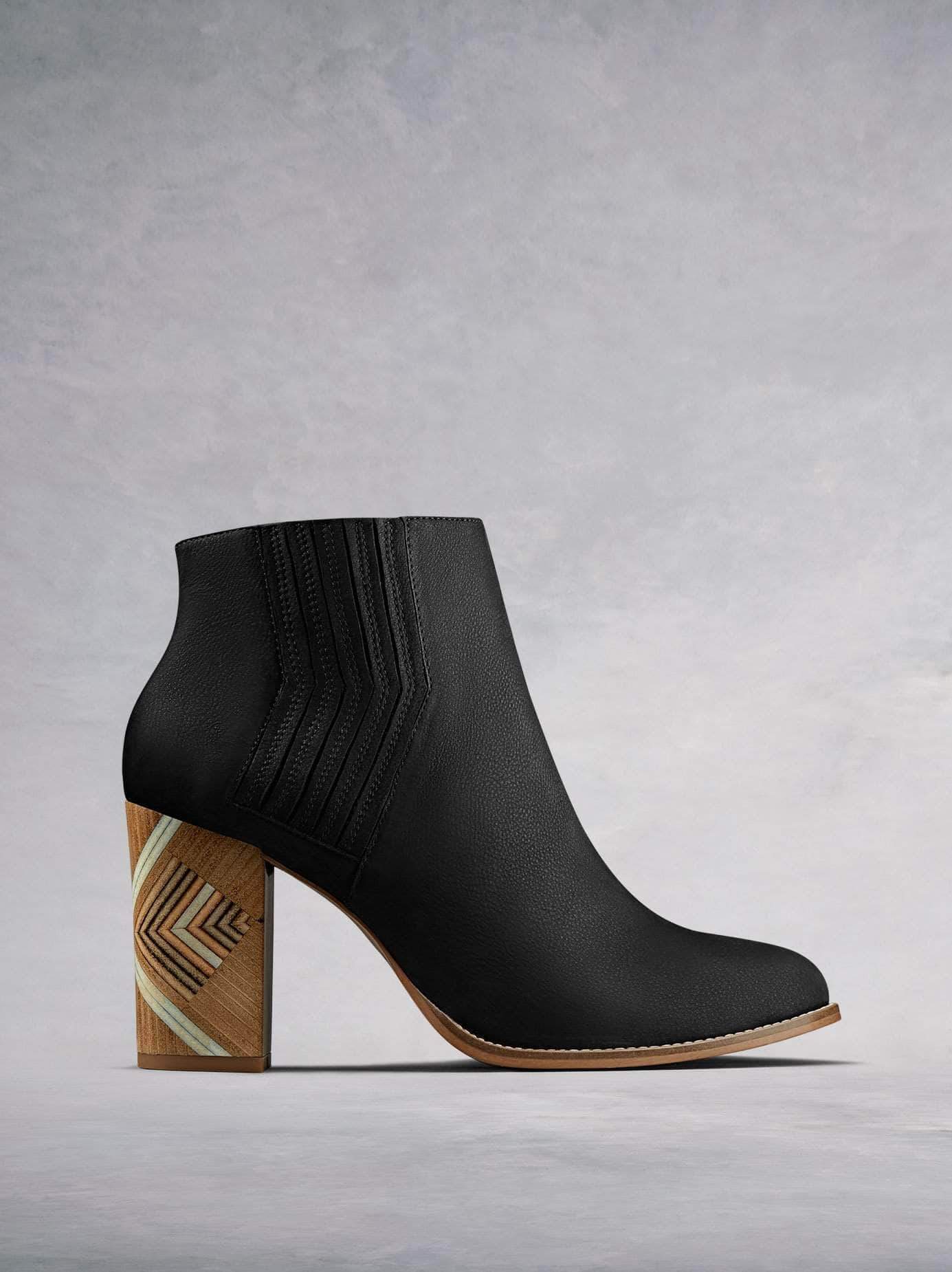Stay on-trend in our unique Paragon Chelsea boot with hand stacked high block heel. Made from luxury black nubuck leather. Available in our standard or wide fit.