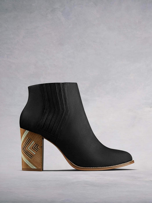 Stay on-trend in our unique Paragon Chelsea boot with hand stacked high block heel. Made from luxury black nubuck leather. Available in our standard or wide fit.