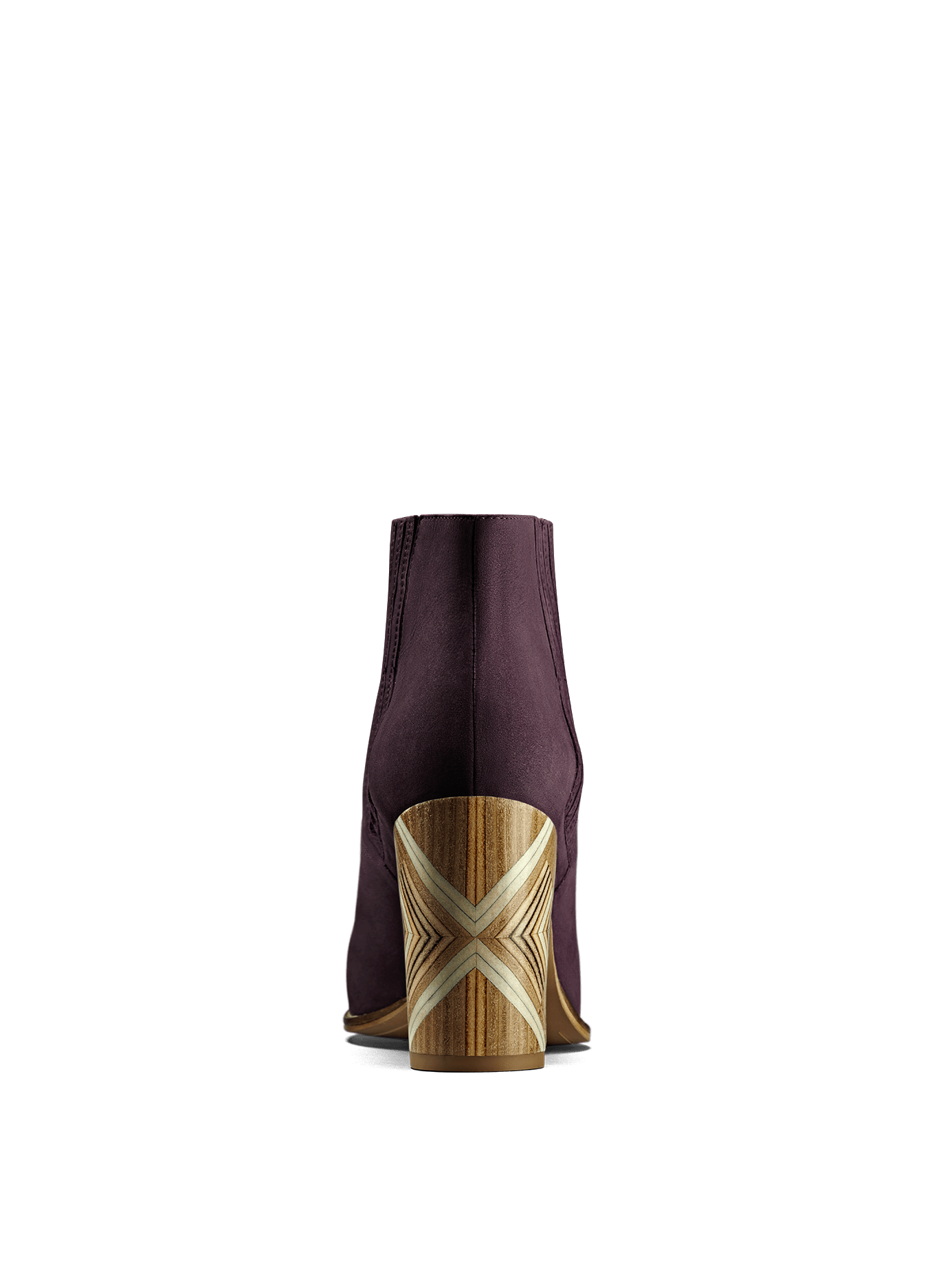 The handcrafted block heel on Paragon in purple has a unique statement pattern.