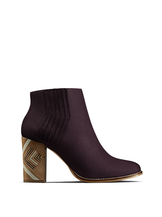 Paragon, a luxury purple nubuck Chelsea boot with a hand stacked leather heel.