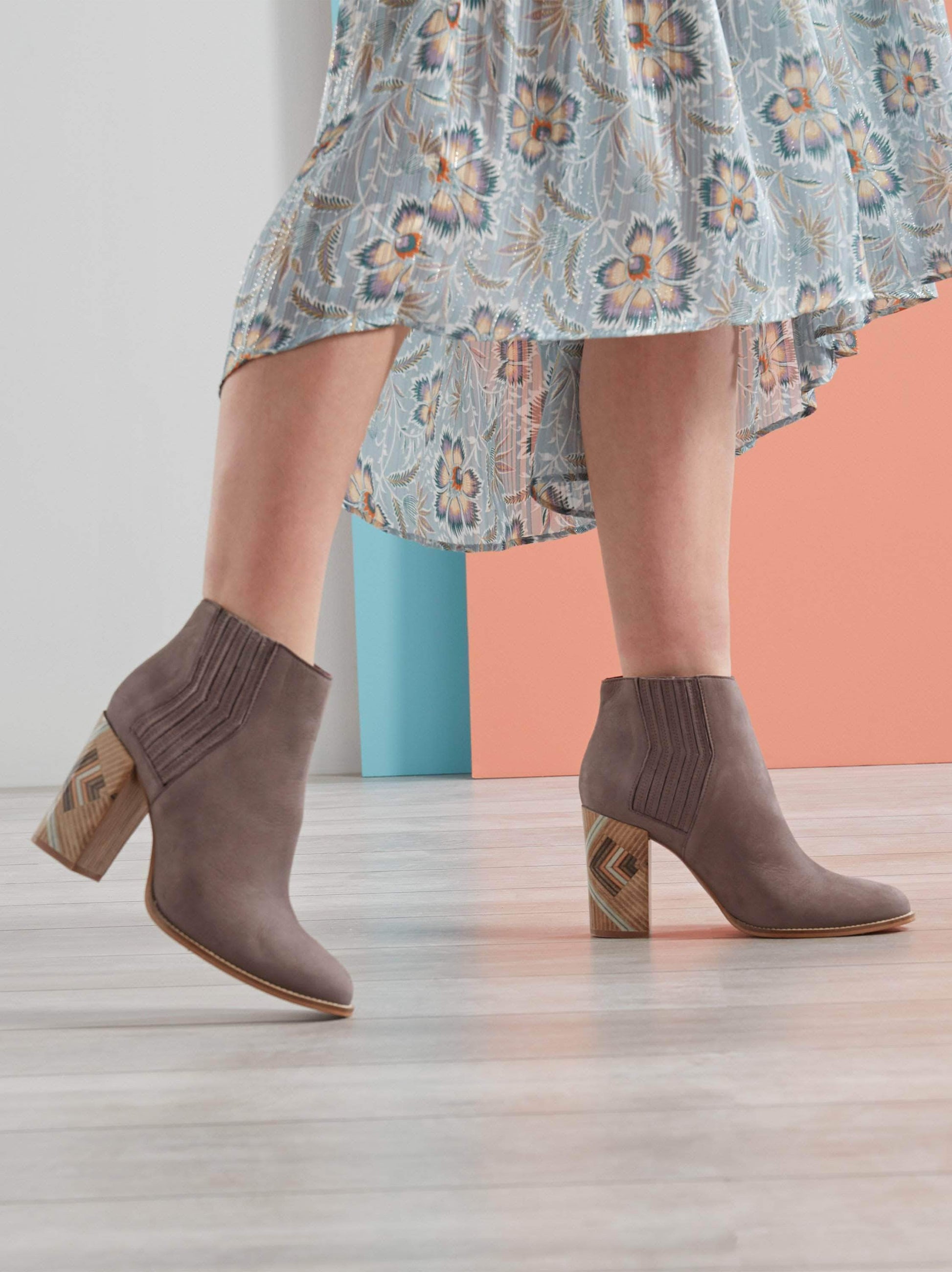 Paragon, a mid-height heeled ankle boot with a unique pattern.