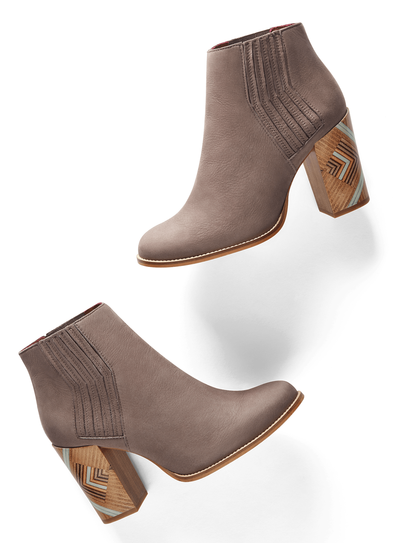 Paragon, a mid-height heeled ankle boot with a unique pattern.
