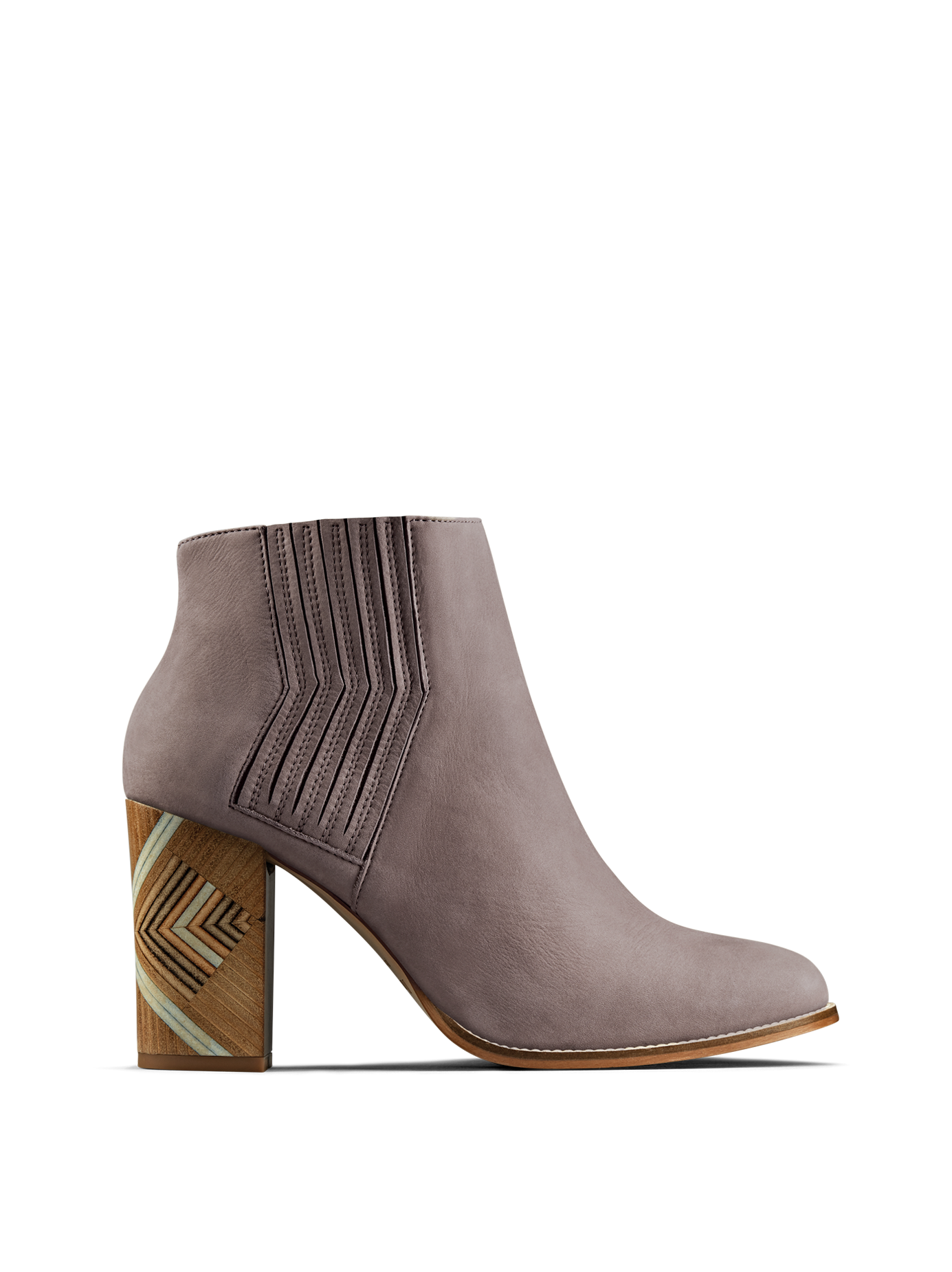 Paragon, our luxury taupe nubuck Chelsea boot with a hand stacked leather heel.