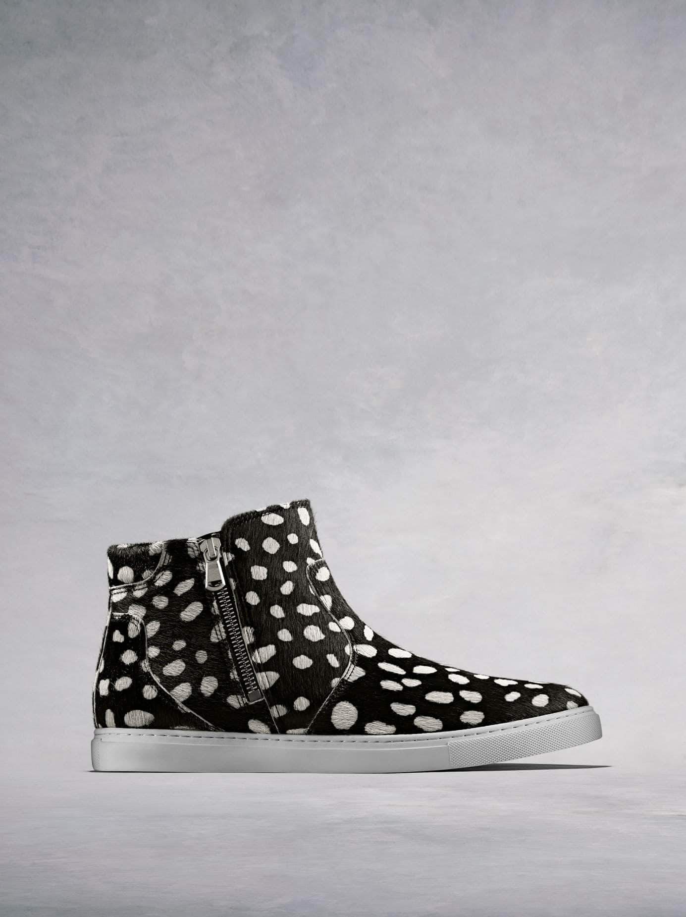 Parsonage, a stylish hi-top trainer in black and white hair leather.  