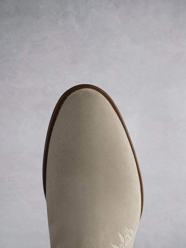 Paxton in taupe suede features an  almond toe shape on a premium sole.