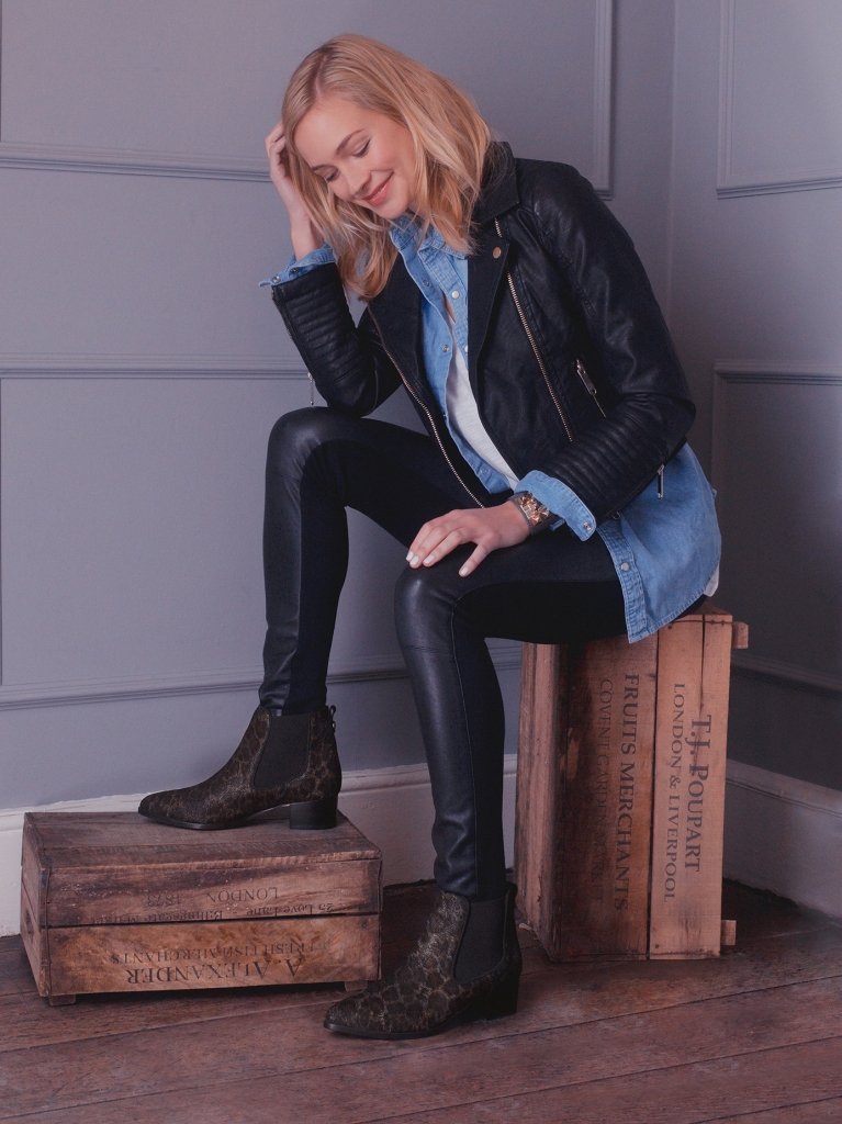 The leopard print ankle boot features a comfortable low block heel. 