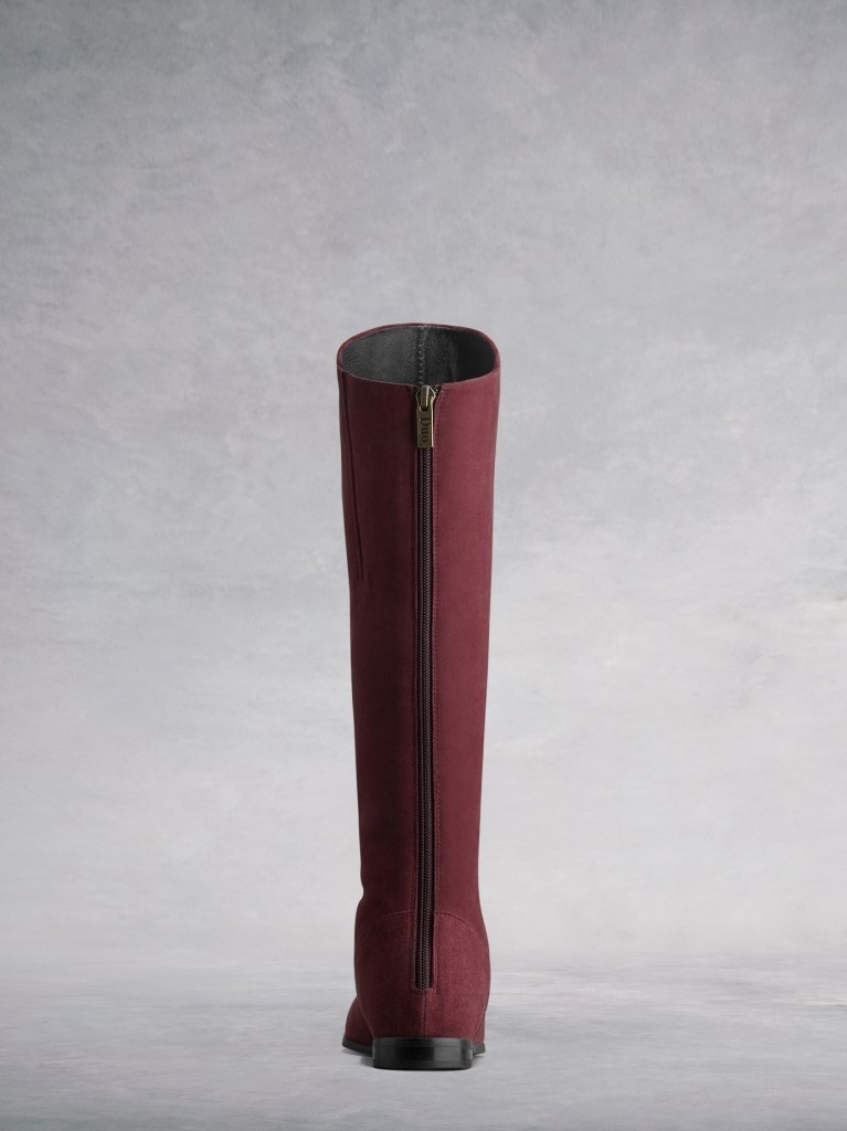 The burgundy Raven has a subtle zip down the back, and an asymmetric front.