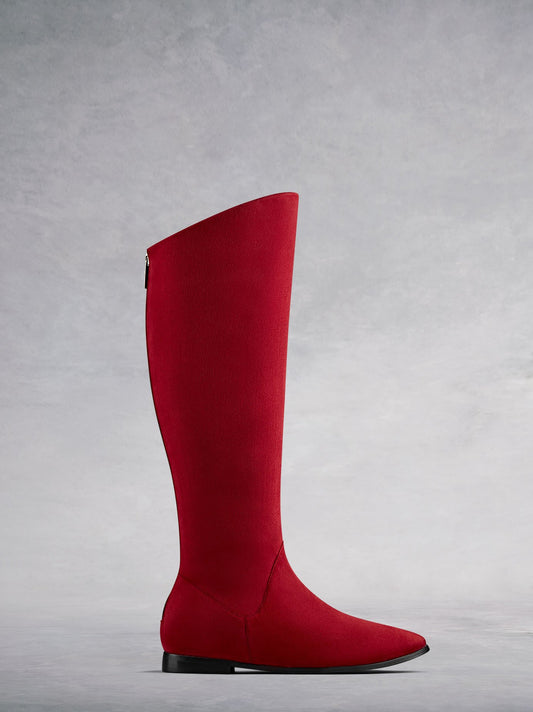 Raven, our flat red suede boot with a hidden wedge to give you a little more lift. Available in a wide range of calf sizes.