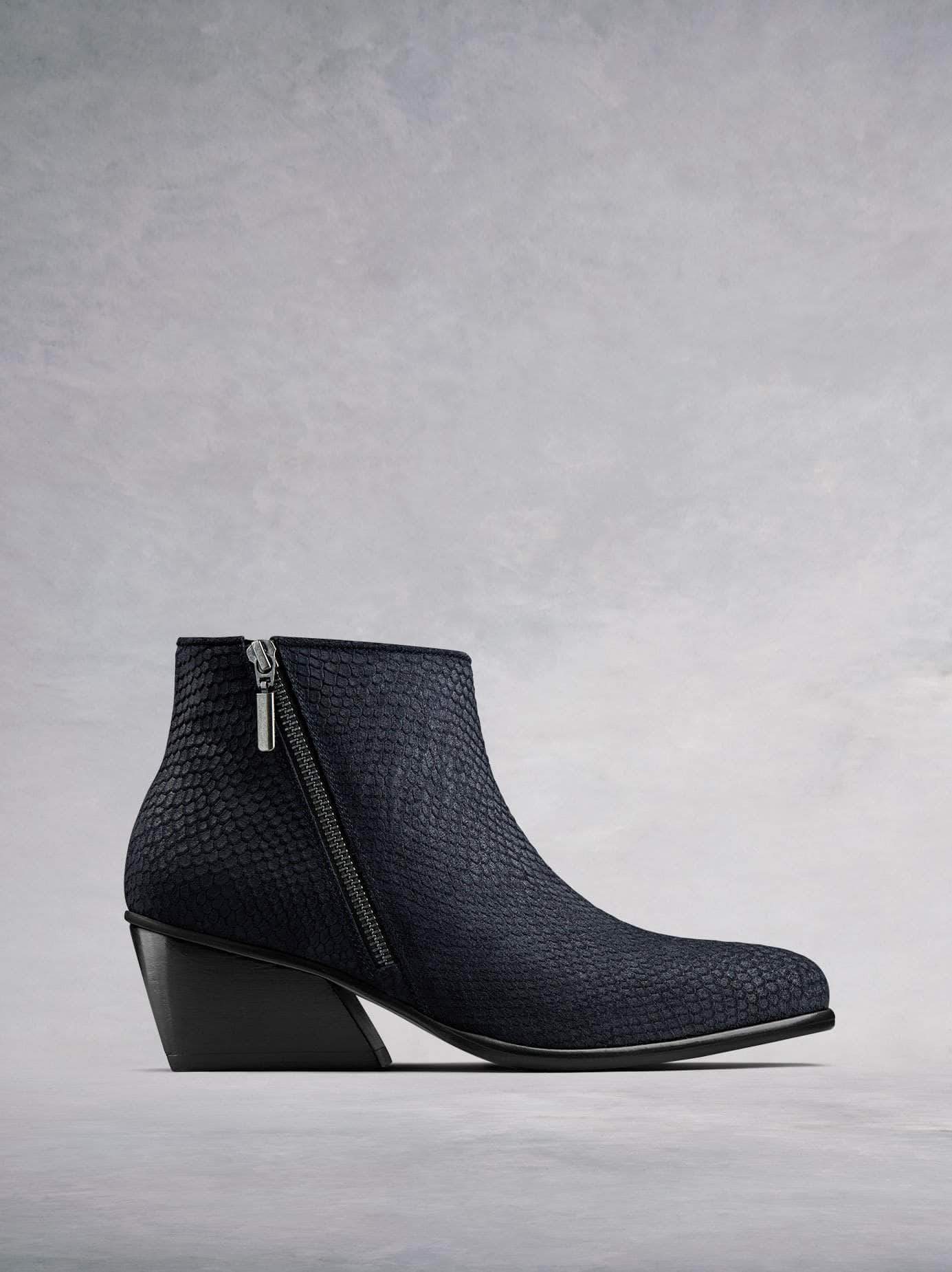 Renata, our on-trend ankle boot with angular heel and diagonal zip in navy snake embossed suede. Stand-out style. Available in our standard or wide fit ankle widths.