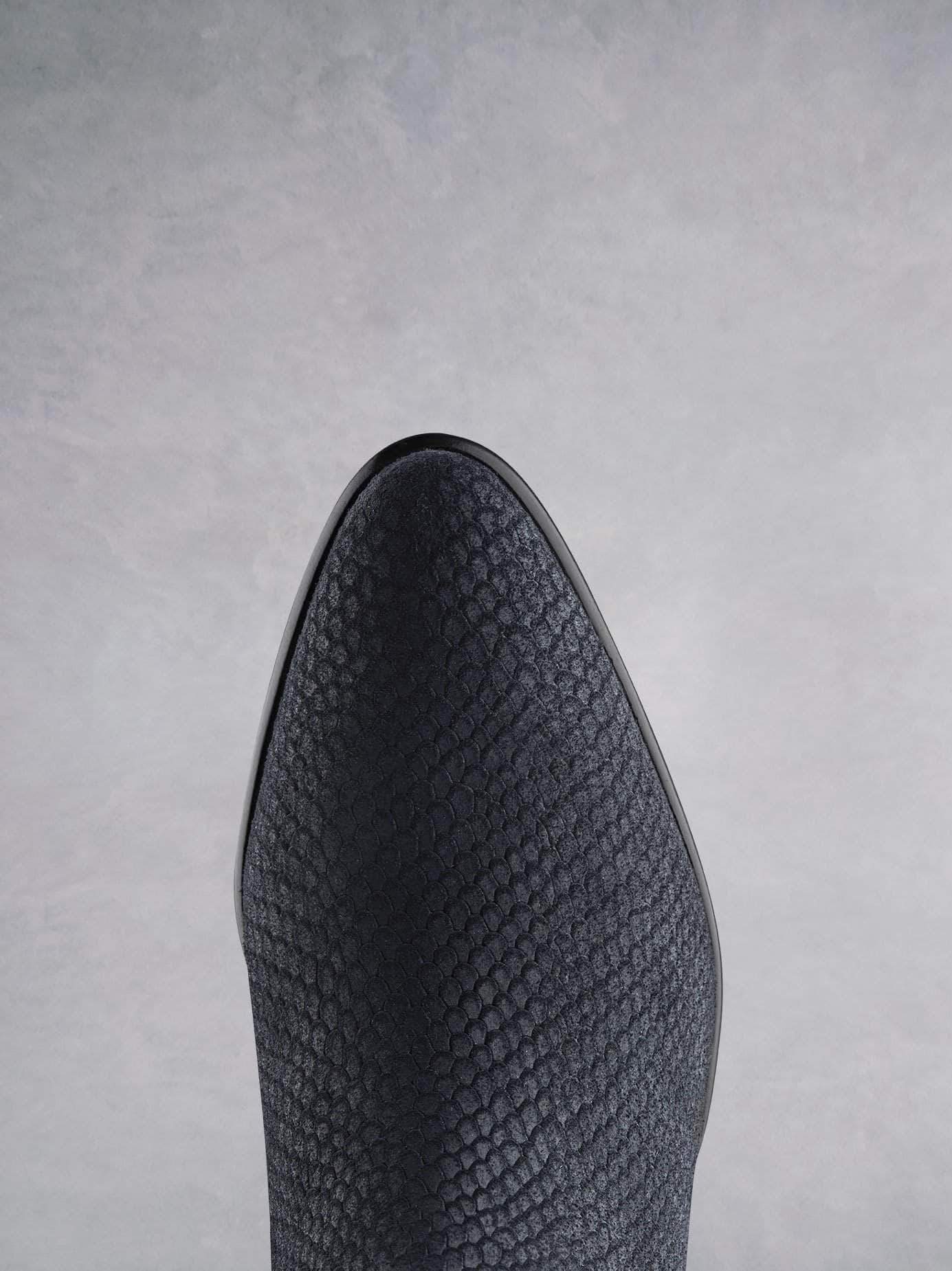 Renata in navy snake embossed suede has a stylish almond toe shape. 