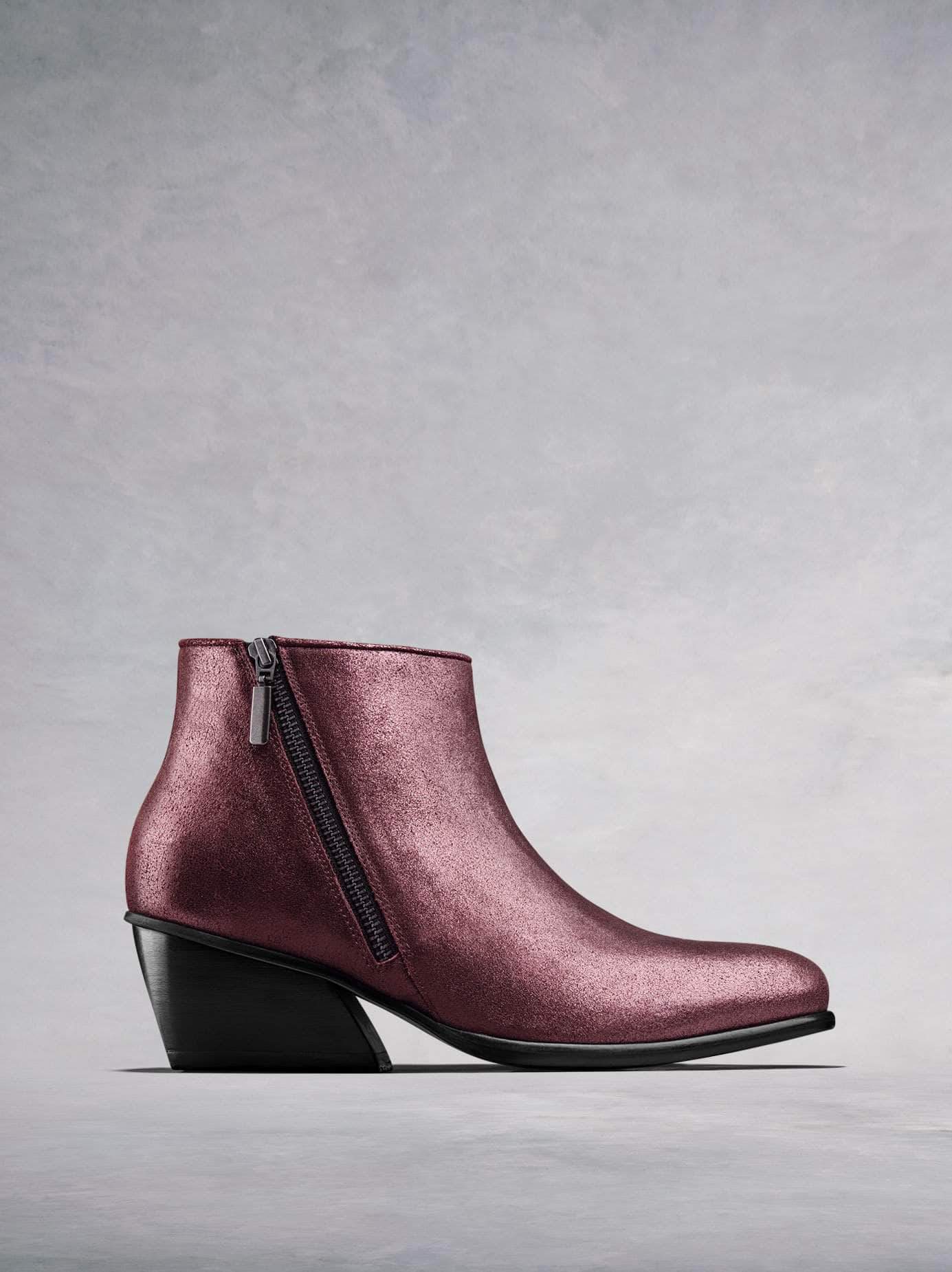 Renata, our on-trend ankle boot with angular heel and diagonal zip in plum metallic leather. Stand-out style. Available in our standard or wide fit.