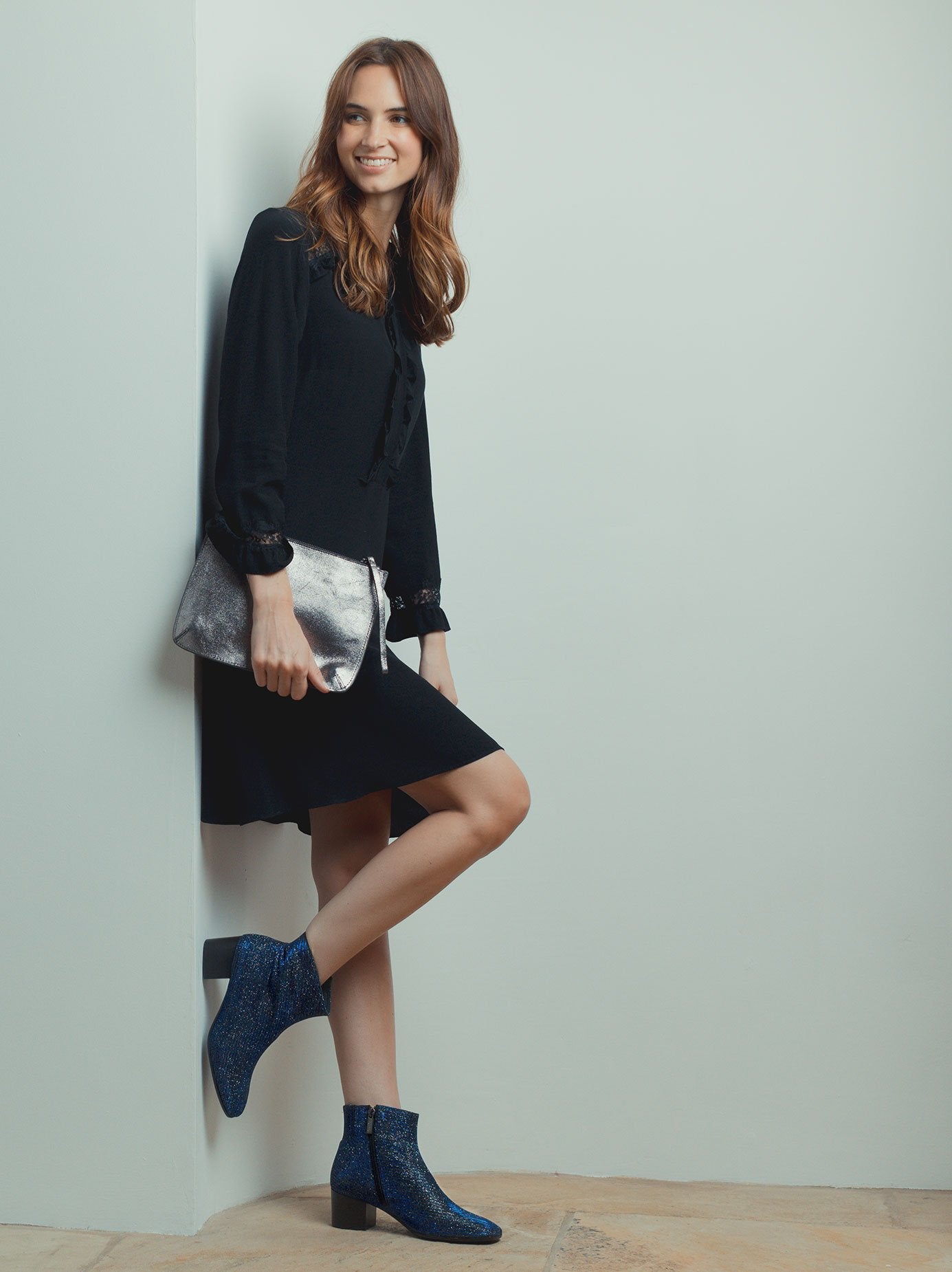 Simple yet stylish brown mock croc leather ankle boot with a low block heel. 