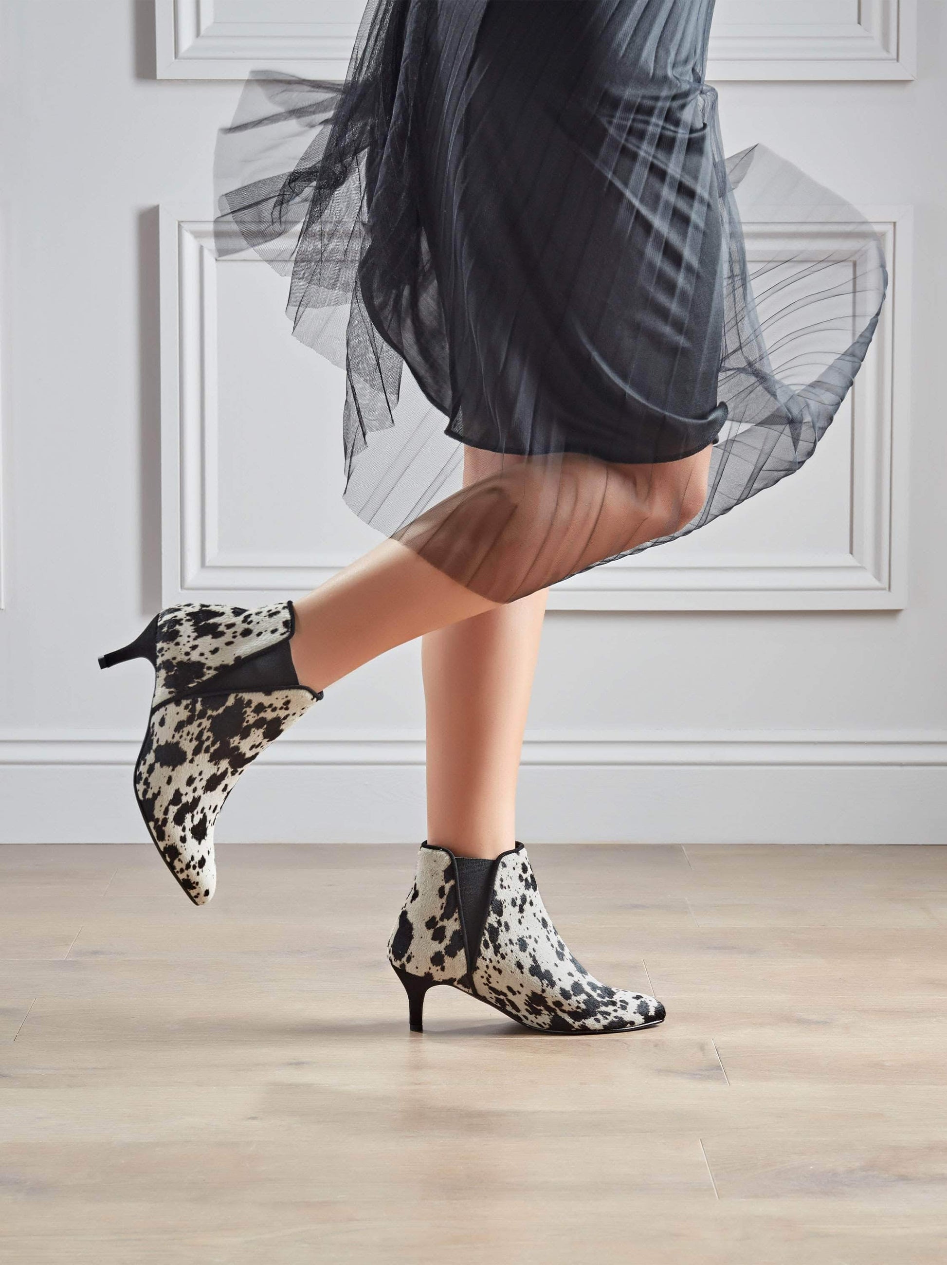 Our Somerton kitten heel Chelsea boot, go bold in cow print hair leather.