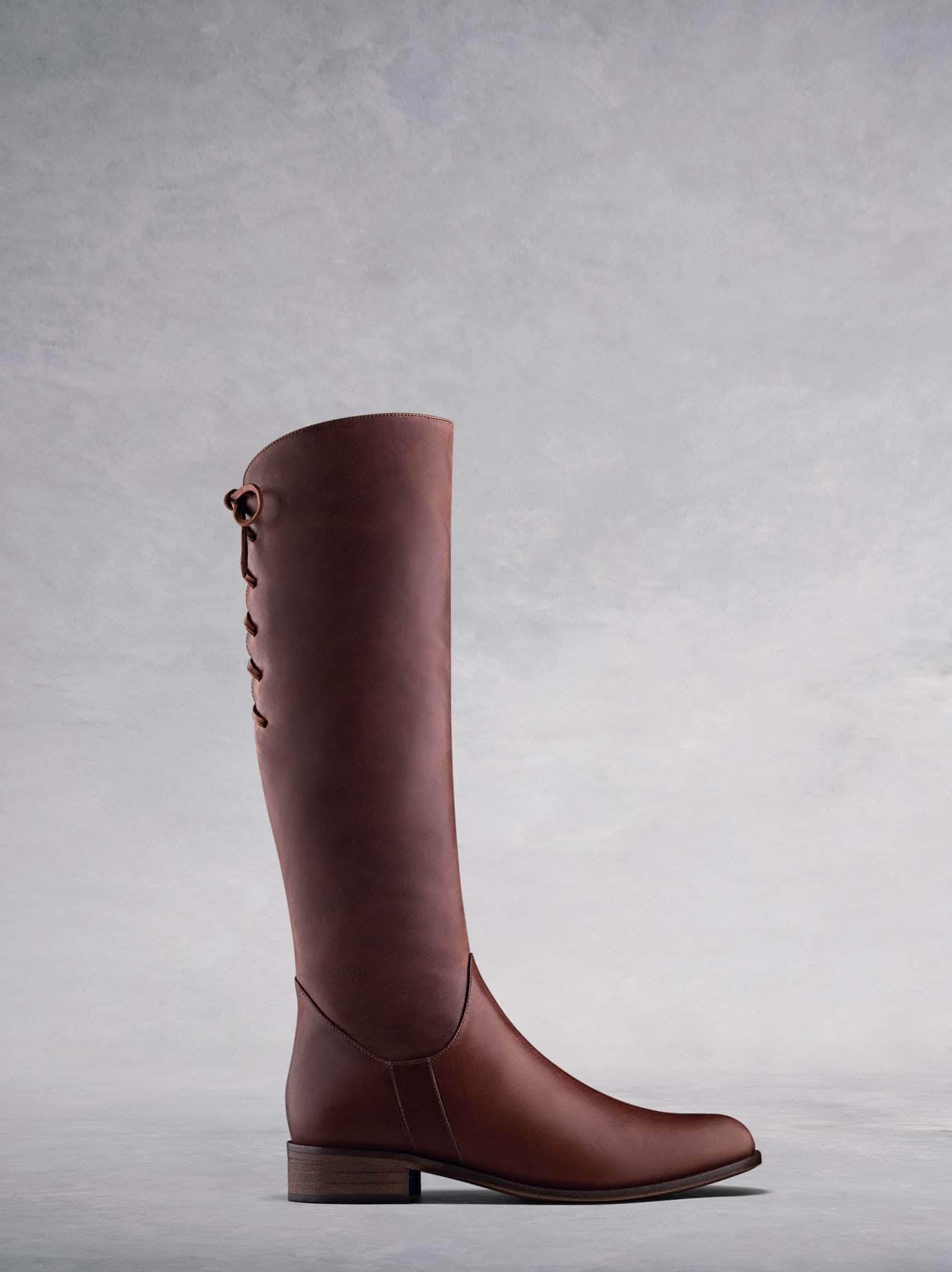 Thornbank, our casual rustic brown leather knee high boot with lace-up detailing at the back. Available in a wide range of calf sizes.