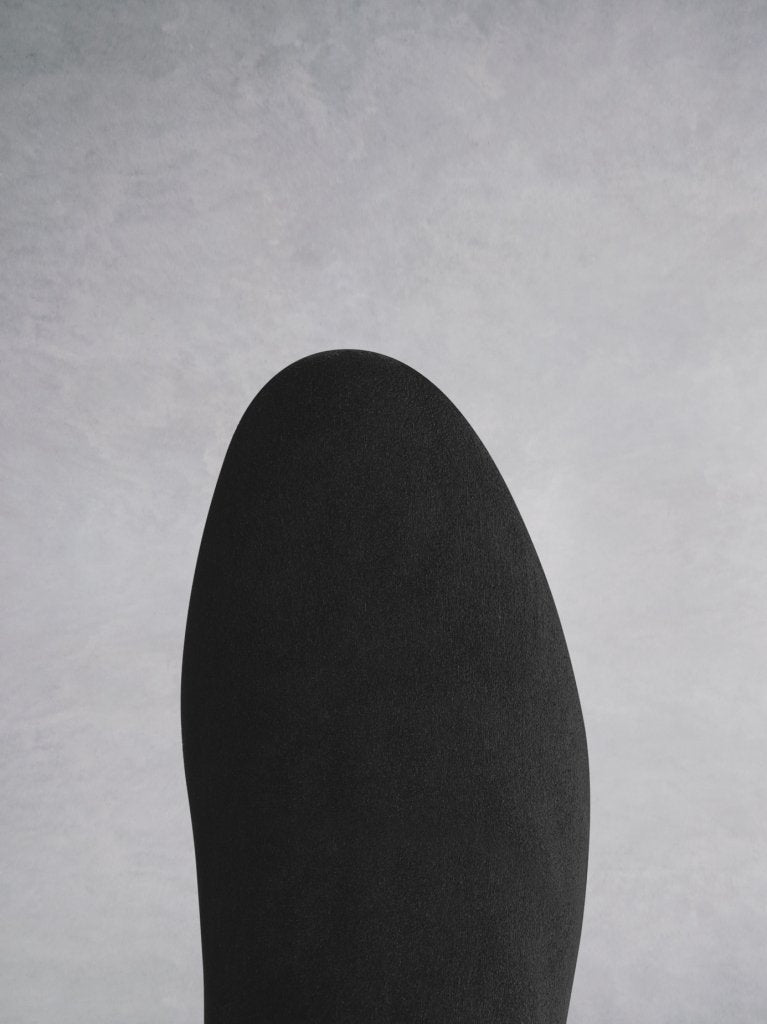 Tigerlily black suede; the round toe shape complements the curved topline seam. 