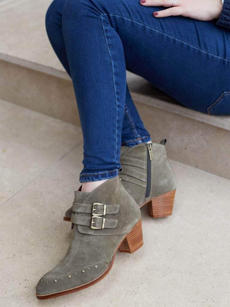 This khaki ankle boot has two buckled suede straps, finished with a luxe leather lining. 