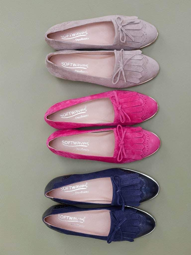 This navy pump has broguing and statement fringe tassel detailing. 
